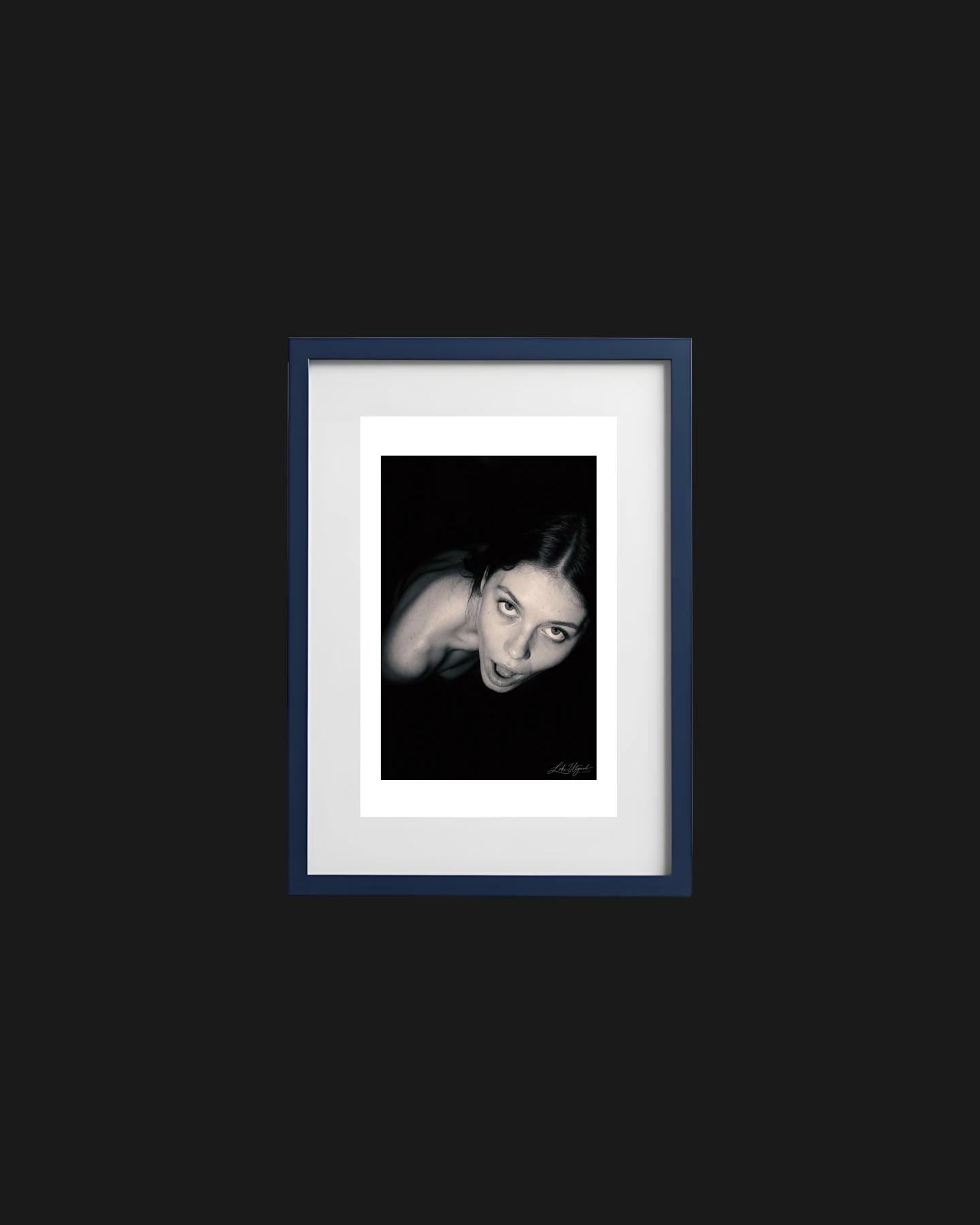 Framed collector edition titled Lisel in the Hole, showing a monochrome portrait viewed from above